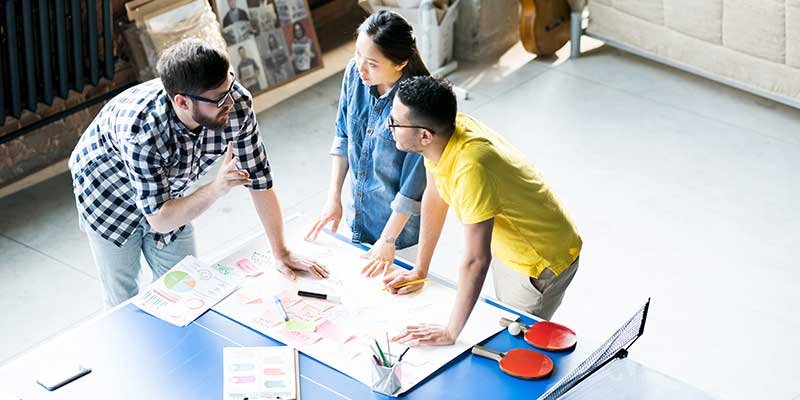 people planning out a business model business outsourcing services